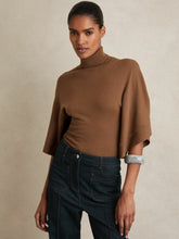 Merino Wool Batwing Roll-Neck Jumper in Tan | Reiss Near Me
