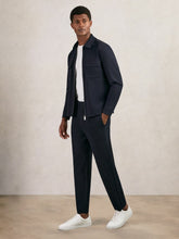 Tapered Knitted Trousers in Navy | Reiss