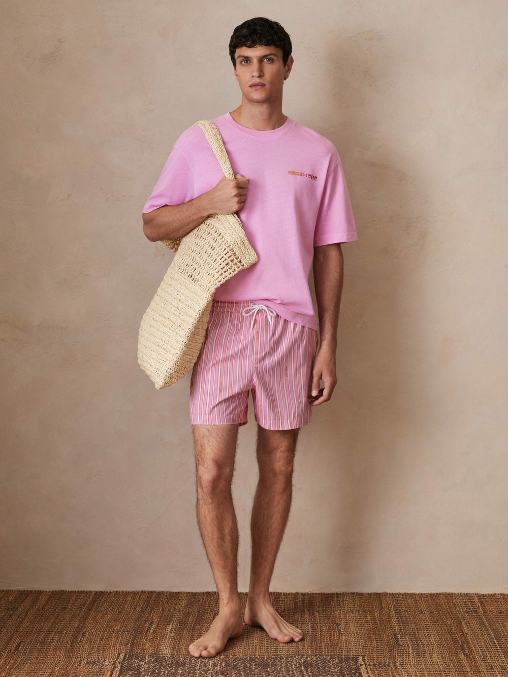 | Ché Stripe Swim Shorts in Pink/White | Reiss