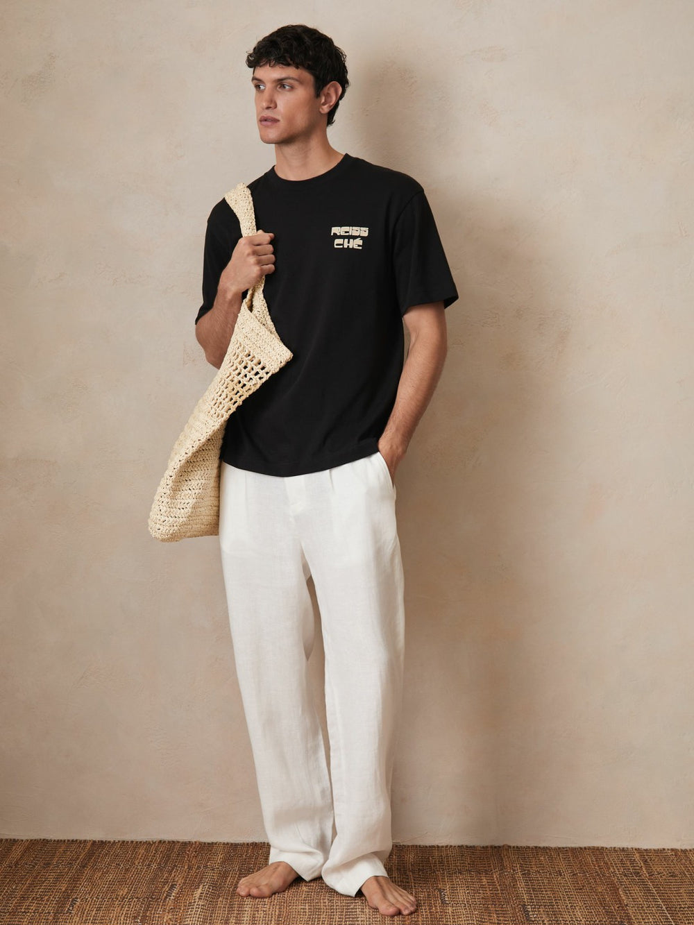 | Ché Cotton Palm-Print T-Shirt in Black | Reiss USA
