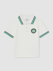 3-9 yrs SmileyWorld Piqué Polo Shirt in White | Reiss US