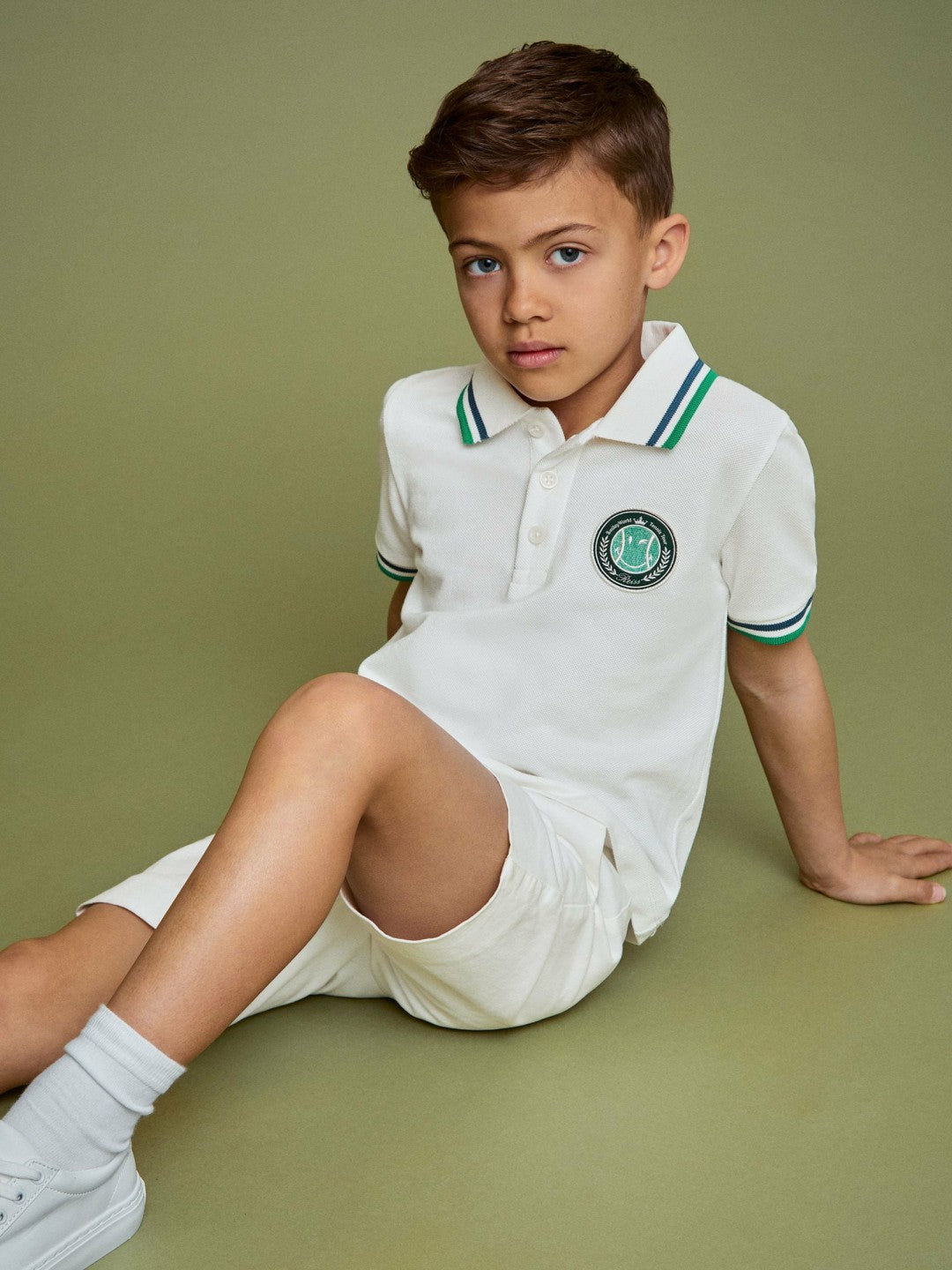 3-9 yrs SmileyWorld Piqué Polo Shirt in White | Reiss US