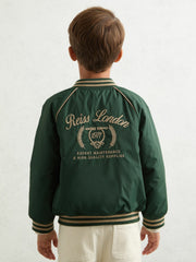 13-14 yrs Motor Cars Embroidered Bomber Jacket in Forest Green/Off White | Reiss USA