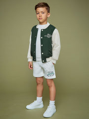 9-13 yrs SmileyWorld Bomber Jacket in Dark Green | Reiss US