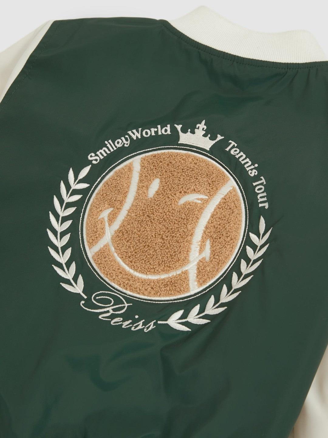 9-13 yrs SmileyWorld Bomber Jacket in Dark Green | Reiss US