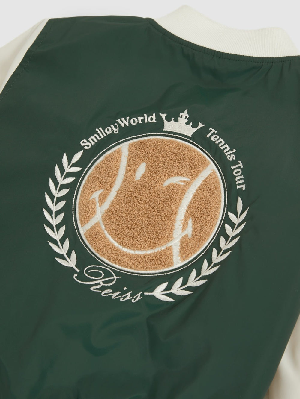9-13 yrs SmileyWorld Bomber Jacket in Dark Green | Reiss US