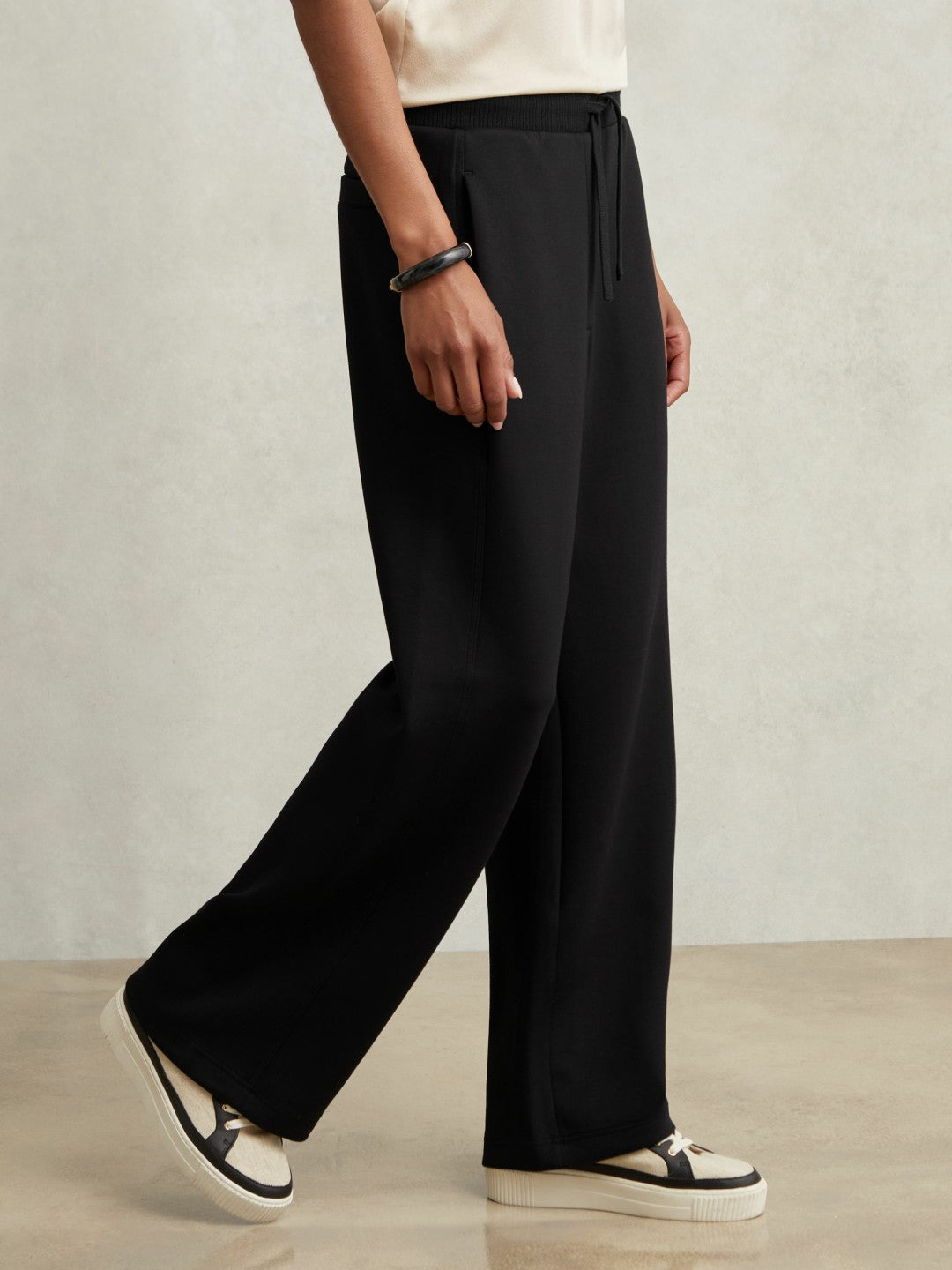 Petite Wide-Leg Interlock Drawstring Joggers in Black | Reiss Sale