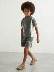 3-9 yrs Chenille Tipped Motor Cars Polo Shirt in Dark Sage Green/White | Reiss Onsale